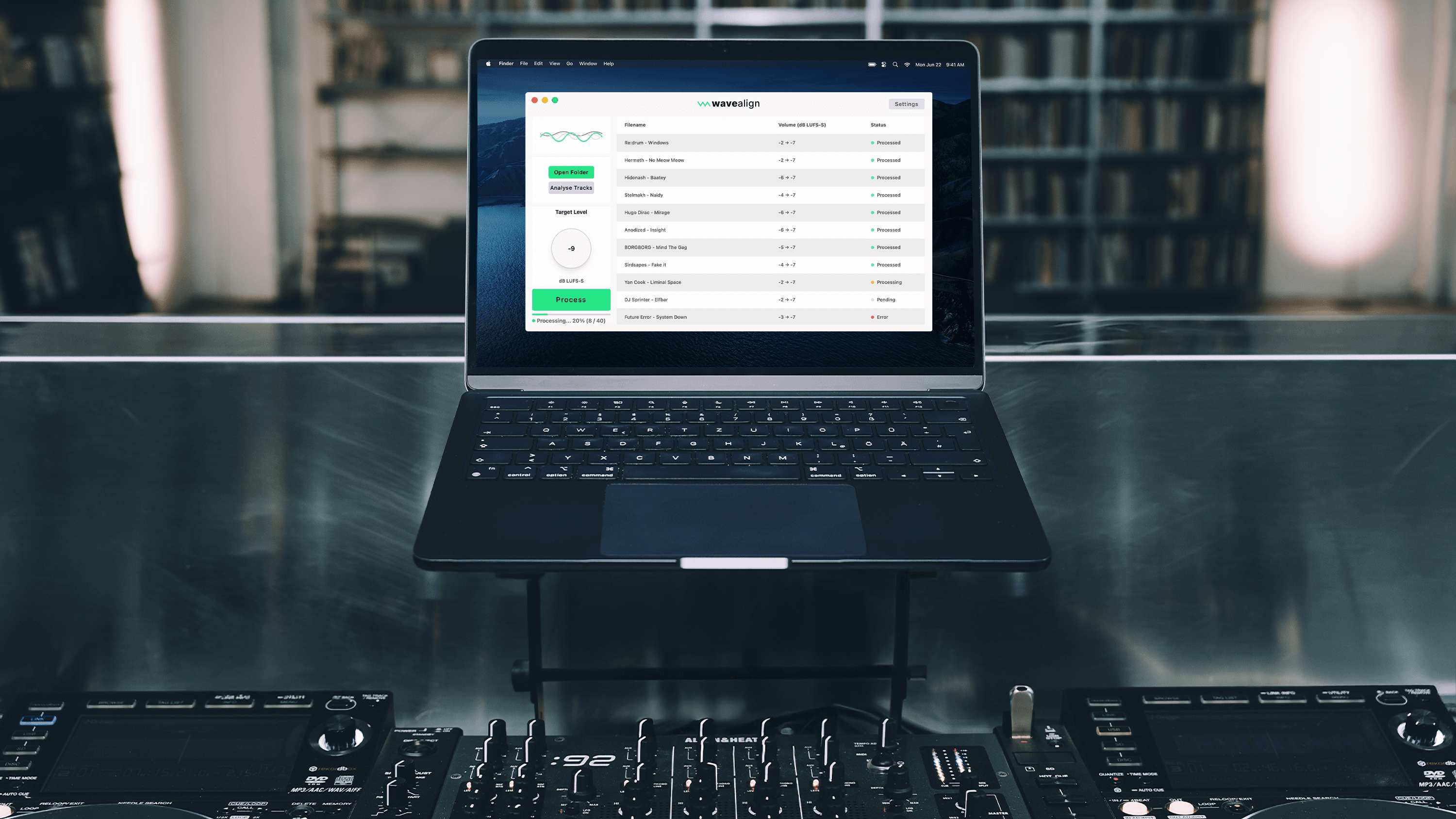 A scene of two digital media players (CDJs) a mixer and a laptop showing the waveAlign application